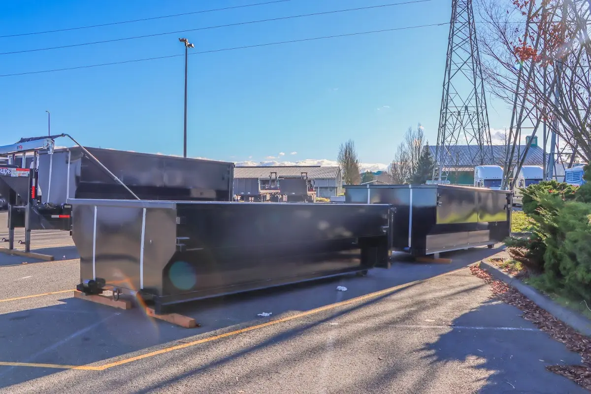 Roll-off dumpster ready for waste disposal at job site for 2 Yard Dumpster Rental in Chisago City